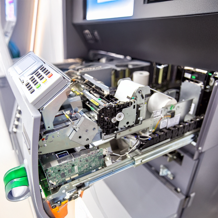 Open ATM machine showing internal components and circuitry, highlighting advanced technology for ATM service, repair, and modern cashless solutions.